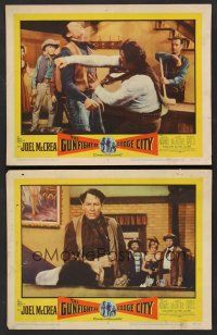 3p728 GUNFIGHT AT DODGE CITY 2 LCs '59 Joel McCrea in fistfight in a bar, Richard Anderson watches!