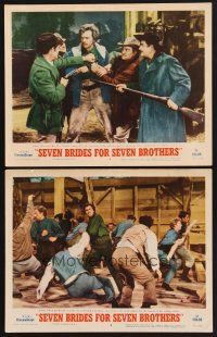 3p885 SEVEN BRIDES FOR SEVEN BROTHERS 2 LCs '54 Howard Keel in action in classic MGM musical!