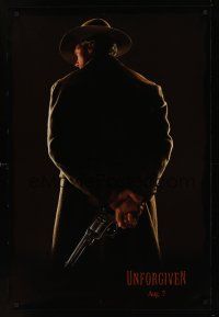 3y853 UNFORGIVEN dated DS teaser 1sh '92 image of gunslinger Clint Eastwood with back turned!