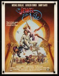 3z323 JEWEL OF THE NILE signed special 19x22 '85 by Michael Douglas, cool art with Turner & DeVito!