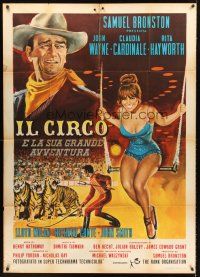 4a215 CIRCUS WORLD Italian 1p '65 different art of Claudia Cardinale on trapeze & John Wayne!