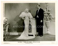 4h266 GOIN' TO TOWN 8x10 still '35 Paul Cavanagh stares at sexiest Mae West in fancy outfit!