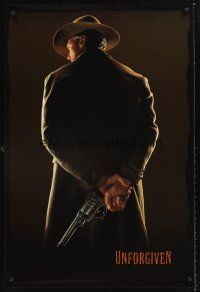 4t169 UNFORGIVEN undated teaser 1sh '92 classic image of gunslinger Clint Eastwood with back turned!