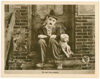 4y045 DOG'S LIFE LC '18 classic close image of Charlie Chaplin sitting with his beloved dog!