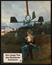 5g932 STUNT MAN German LC '80 great image of Peter O'Toole sitting on strange contraption!