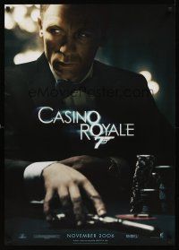 5j272 CASINO ROYALE teaser DS German '06 Craig as James Bond sitting at poker table w/gun!