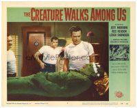5z172 CREATURE WALKS AMONG US LC #8 '56 three guys watch wounded monster laying on table!