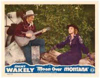 6b766 MOON OVER MONTANA LC '46 c/u of singing cowboy Jimmy Wakely playing guitar for Jennifer Holt!