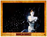 6b769 MOULIN ROUGE LC '01 close up of sexiest barely-dressed Nicole Kidman in top hat on swing!