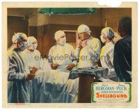 6b924 SPELLBOUND LC '45 Alfred Hitchcock, doctor Gregory Peck in operating room removes mask!
