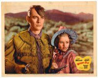 6b983 WESTERN GOLD LC '37 close up of Smith Ballew with two guns protecting pretty Heather Angel!