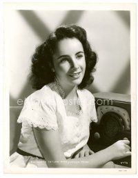 6c266 ELIZABETH TAYLOR 8x10 still '40s great young seated close up tuning old time radio!