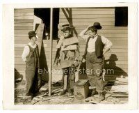 6c280 FINISHING TOUCH 8x10 still '28 wacky Stan Laurel & Oliver Hardy nail siding to policeman!