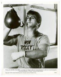 6c637 ROCKY 8x10 still '77 great image of boxer Sylvester Stallone on speed bag!
