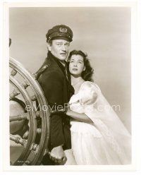 6c805 WAKE OF THE RED WITCH 8x10 still '49 c/u of John Wayne & Gail Russell by ship's wheel!