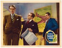 6x014 THINGS TO COME LC '36 Raymond Massey watches man holding paper giving younger man advice!