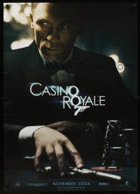 7b390 CASINO ROYALE teaser DS German '06 Craig as James Bond sitting at poker table w/gun!