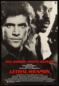 7c352 LETHAL WEAPON 1sh '87 great close image of cop partners Mel Gibson & Danny Glover!