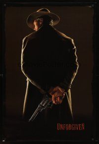 7c672 UNFORGIVEN undated teaser 1sh '92 classic image of gunslinger Clint Eastwood w/back turned!