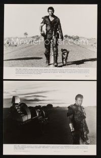 7f914 MAD MAX 2: THE ROAD WARRIOR 2 7.5x9.25 stills '81 classic image of Mel Gibson on road with dog