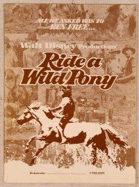 7p386 RIDE A WILD PONY pb '76 Disney, cool artwork of boy on white horse riding alongside train!