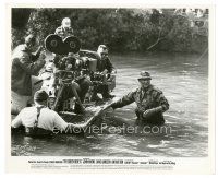 7w078 GREEN BERETS candid 8x10 still '68 director John Wayne pulls raft with camera!