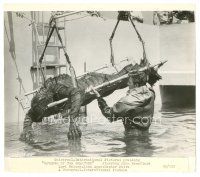 7w107 REVENGE OF THE CREATURE candid 8x9.25 still '55 crew member helps lower the monster in water!