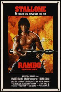 8e597 RAMBO FIRST BLOOD PART II style A int'l 1sh '85 no law, no war can stop Sylvester Stallone!