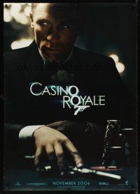8r107 CASINO ROYALE teaser DS German 33x47 '06 Daniel Craig as Bond sitting at poker table w/gun!