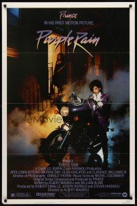 9c650 PURPLE RAIN 1sh '84 great image of Prince riding motorcycle, in his first motion picture!