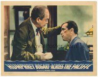 9d183 ACROSS THE PACIFIC LC '42 older man tends to cut on Humphrey Bogart's cheek!