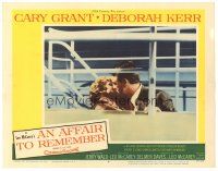 9d190 AFFAIR TO REMEMBER LC #6 '57 romantic close up of Cary Grant kissing Deborah Kerr on ship!