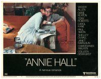 9d205 ANNIE HALL LC #5 '77 Woody Allen kissed by Diane Keaton as he reads the newspaper!