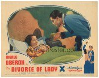 9d357 DIVORCE OF LADY X LC '38 Merle Oberon in bed smiles up at Laurence Olivier!