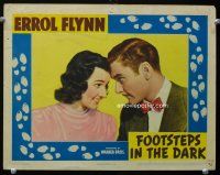 9d397 FOOTSTEPS IN THE DARK LC '41 close up of Errol Flynn butting heads with Brenda Marshall!