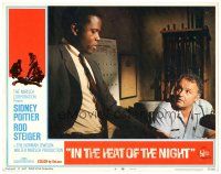 9d499 IN THE HEAT OF THE NIGHT LC #4 '67 cop Rod Steiger looks up at Sidney Poitier in office!