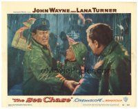 9d761 SEA CHASE LC #8 '55 John Wayne & Lana Turner wearing raincoats in storm on ship's deck!