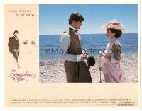 9d806 SOMEWHERE IN TIME LC '80 great c/u of Christopher Reeve & Jane Seymour on beach!