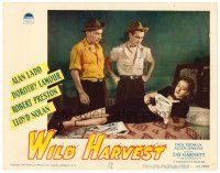 9d967 WILD HARVEST LC #3 '47 Alan Ladd & Lloyd Nolan stare at Dorothy Lamour reading on bed!