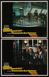 9g849 DIAMONDS ARE FOREVER 2 int'l LCs '71 Sean Connery as James Bond walking over huge scale model!