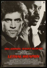 9k425 LETHAL WEAPON advance 1sh '87 great close image of cop partners Mel Gibson & Danny Glover!