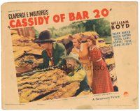 1c267 CASSIDY OF BAR 20 LC '38 William Boyd as Hopalong Cassidy w/gun taking cover behind rocks!