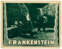 1c302 FRANKENSTEIN LC R38 Dwight Frye holding torch by chained Boris Karloff as the monster!