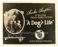 1c022 DOG'S LIFE 8x10 TC '18 great close image of Charlie Chaplin sitting with his beloved dog!