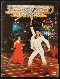 1x457 SATURDAY NIGHT FEVER program '77 disco dancer John Travolta, includes soundtrack record!