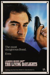 2c398 LIVING DAYLIGHTS teaser 1sh '87 photo of Timothy Dalton as James Bond with gun by Hamshere!