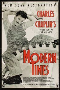 2c443 MODERN TIMES 1sh R90s great image of Charlie Chaplin sitting on gear!