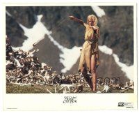 2s008 CLAN OF THE CAVE BEAR 8x10 mini LC '86 Daryl Hannah with cool slingshot standing by bones!
