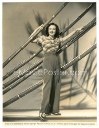 3c594 MARGARET LINDSAY 7.25x9.5 still '40 full-length in great outfit w/giant bamboo by Ray Jones!