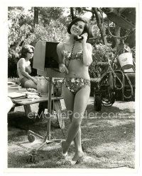 3c664 NANCY KWAN candid 8x10 still '64 wearing bikini, talking on phone on set of Honeymoon Hotel!